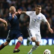 FRIENDLY: England's Jack Wilshere tussles with Scotland's Steven Naismith but is it really that important?