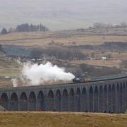 Tornado, the newest steam locomotive in Britain, crosses the Ribbleshead Viaduct in North Yorkshire, on the last day of its scheduled service running from Skipton to Appleby. PRESS ASSOCIATION Photo