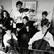members of the musical Lyon family when they played at Hawkshead Church in 1994