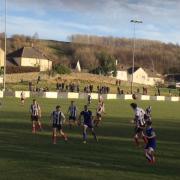 Action from Kendal Town's match against Glossop