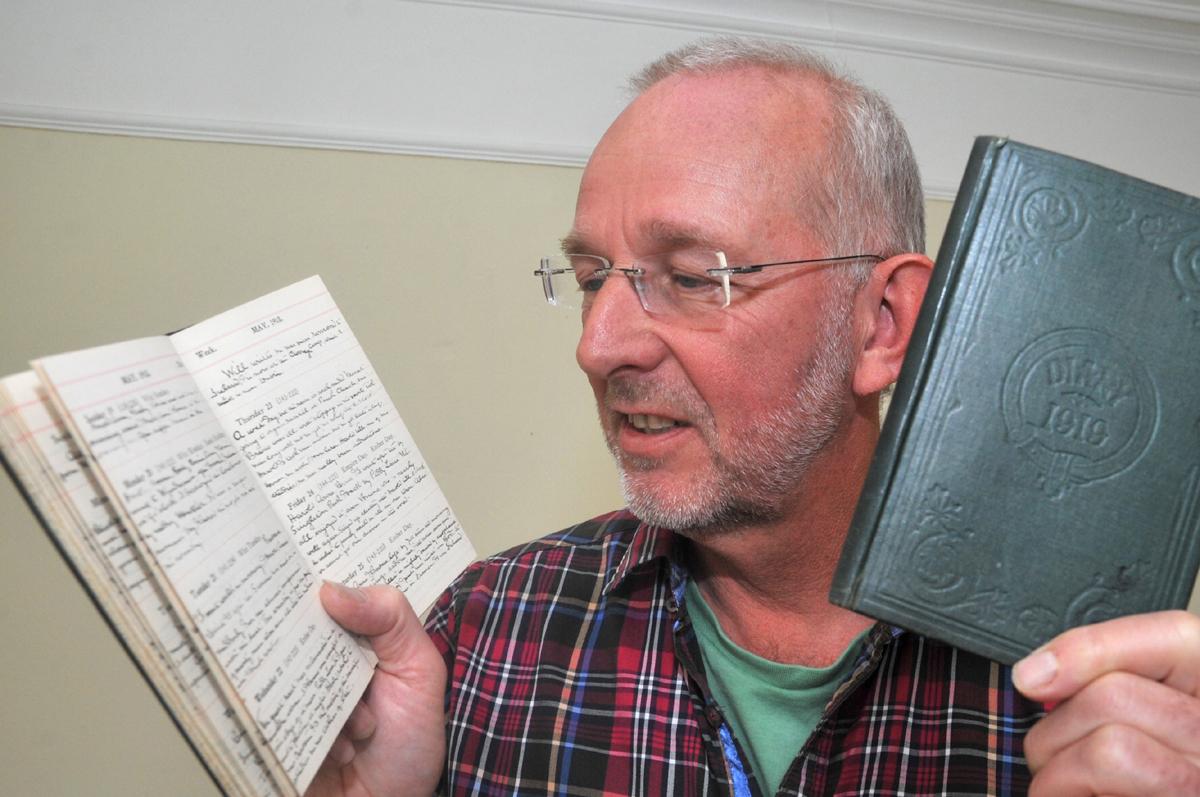 Paul Casson with a fascinating Great War diary kept by Kendal soldier Enoch Bowker, which was discovered in an attic in the town