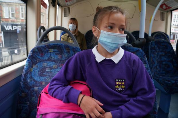 File photo dated 15/6/2020 of a school pupil wearing a face mask. Pupils wearing masks is an option that should be kept under review, a union has said, despite the Education Secretary insisting the measure is not needed as schools in England prepare to