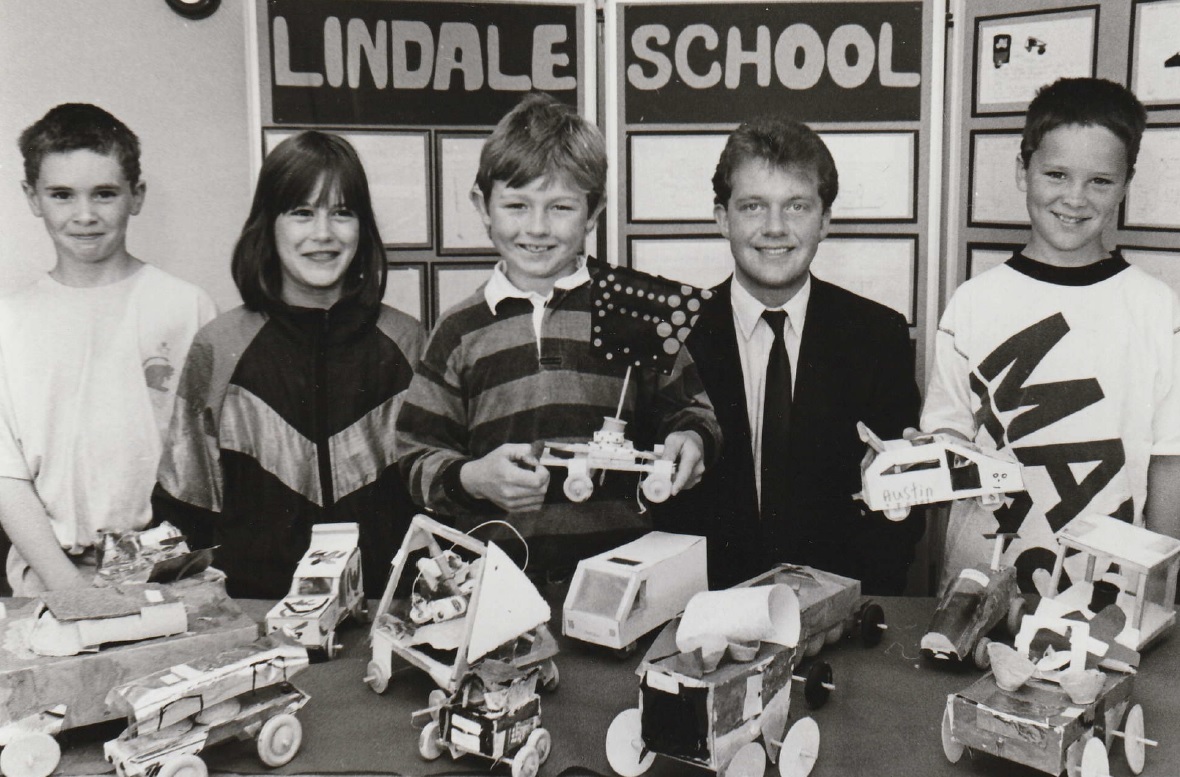 PROJECT: Pupils from Lindale-in-Cartmel Primary School with general manager of Rayrigg Rover (Kendal) Patrick Brennand in 1991, after they won a competition set by the garage to design an environmentally-friendly car for the future