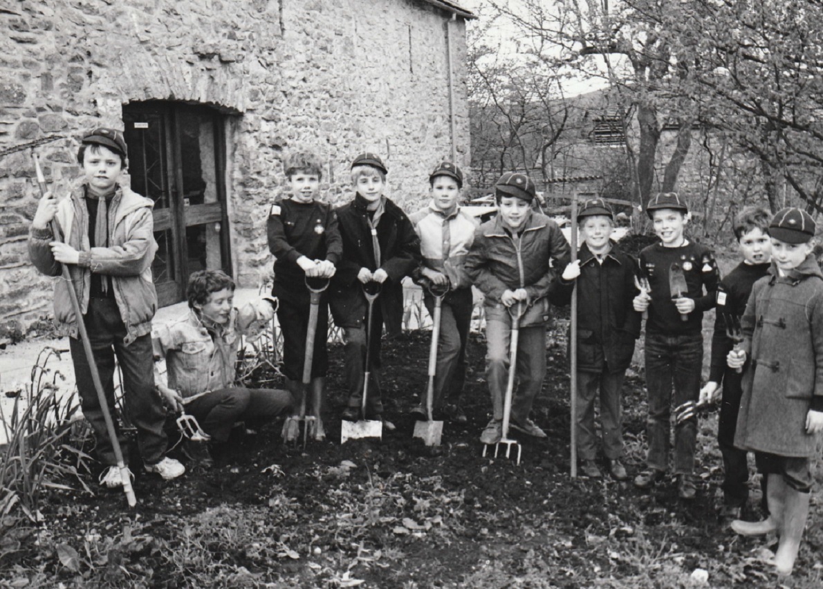 GROUP: Members of the 1st Milnthorpe Cub Scouts poised to start work on their project of preparing and maintaining a garden at Heron Corn Mill, Beetham, in 1989 in preparation for the National Wind and Water Mills Day on May 14 that year. Shrubs and