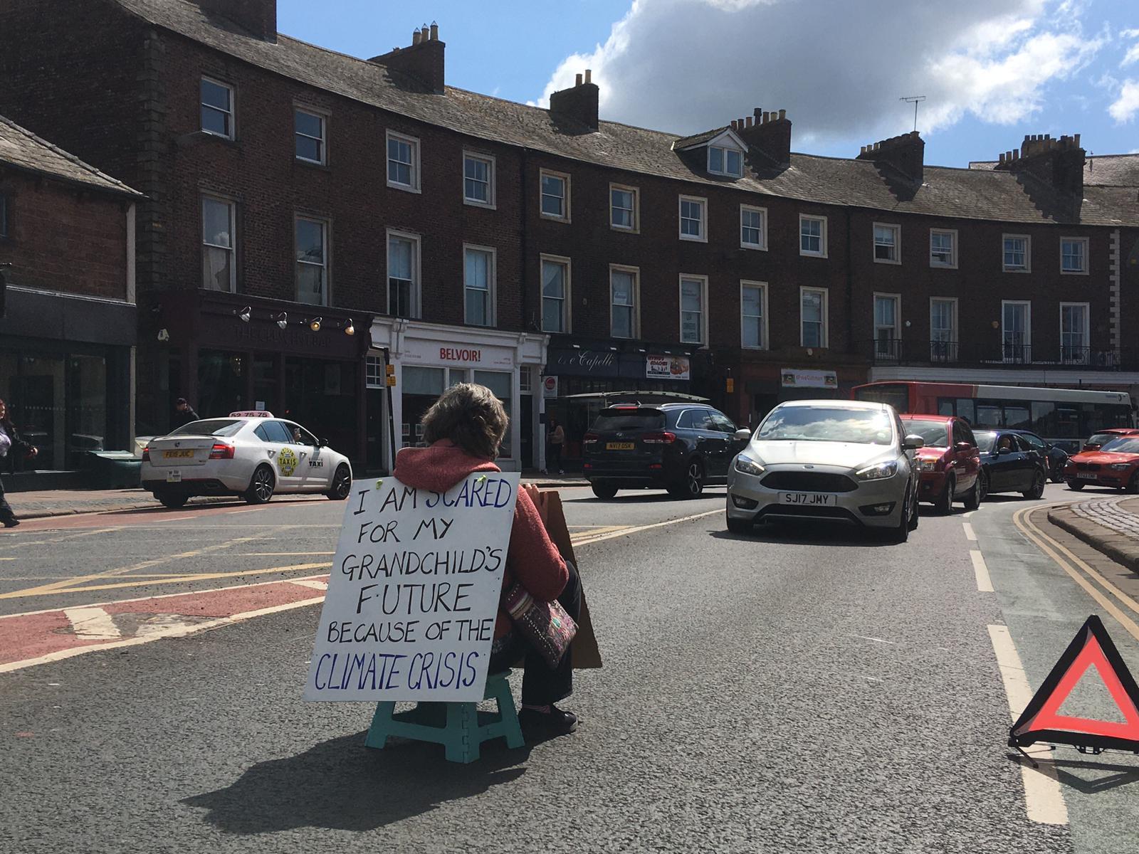 PROTEST: Carlisles Fiona Prior blocking traffic in City Centre in solo climate protest