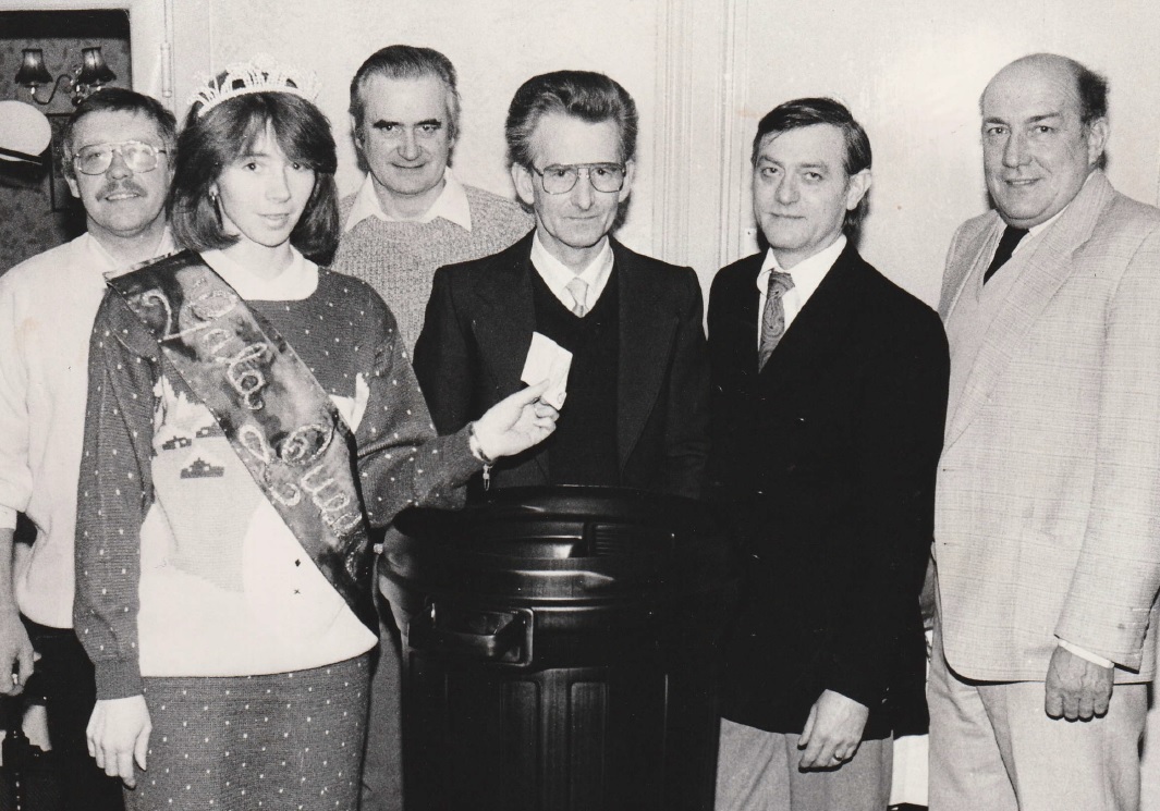 CROWNING: Ambleside Gala Queen Shona Horrax added her support to the local chamber of trade’s annual draw in 1988. She is pictured at the draw for the first prize, which took place at the Queen’s Hotel, Ambleside. With her is (from left): Jim