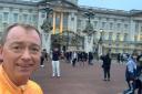 MP Tim Farron runs past Buckingham Palace