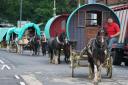 A convoy of horse drawn wagons arrive in Appleby, Cumbria - Owen Humphreys/PA Wire