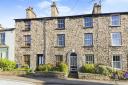 FRONT:  A well presented traditional stone fronted, two double bedroom terraced property located close to the centre of Kendal is on the market