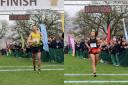 Sam Gunning and Beth Cosgrove cross the finish line as winners of their races