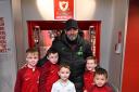 Thomas (back right) with Jurgen Klopp and the other mascots