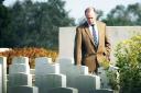 School head Andrew Fleck at a first world war cemetery in Belgium