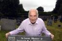 Frank Lomas with the headstone of Sergeant Pittendrigh at Flookburgh graveyard...24/07/2018..JON GRANGER.