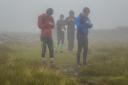 Runners checking their GPS' during the weekend's Kentmere Horseshoe race. Picture: Stephen Wilson