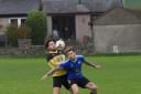 Action from the Ibis versus Windermere match (Picture by Richard Edmondson)