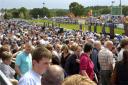 BALMY WEATHER: Crowds enjoy the bank holiday sunshine at Cartmel races. Pictures Victoria Middleton