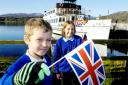 COUP: Heron Hill’s Sam Tattersall and Ellie Maplethorpe prepare to welcome the Olympic torch