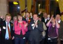 DELIGHTED: Jubilant Labour supporters celebrate after holding Barrow and Furness