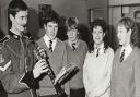 SOLDIERS: Former pupil of Longlands Boys’ School Cpl Terry Robinson, of Kendal, an established member of the King’s Own Border Regiment Band, is pictured in 9186 with a group of sixth form pupils at Queen Katherine School - Peter Watson,