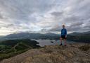 Alex Staniforth summiting Catbells - a fell in the Lake District-
