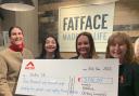 (left to right) Sally, Eliza, Amanda and Clare with the cheque.