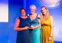 From left-right: Helen Naylor receives her award from Simon Love's wife Julia and daughter Sarah