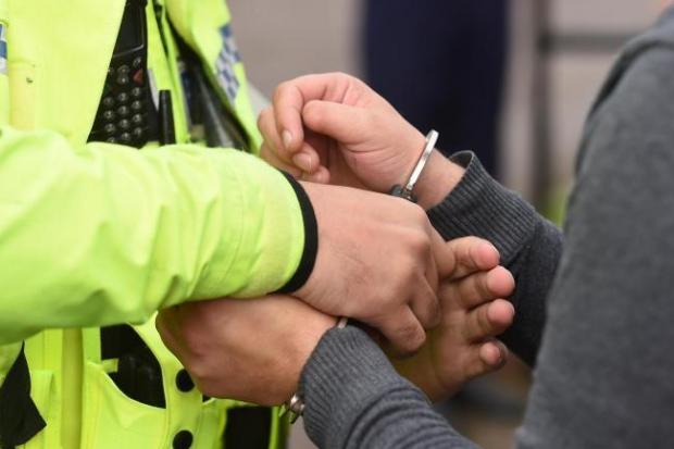 A woman was arrested on suspicion of money laundering in Carnforth