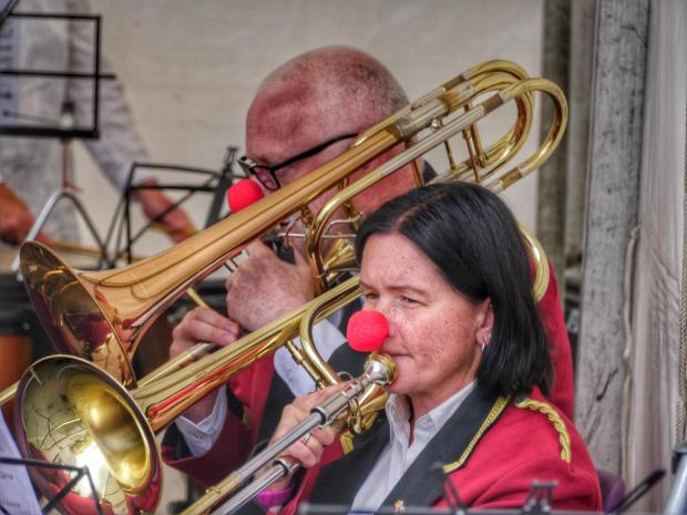 The Westmorland Gazette: The brass band ensemble wearing red noses 