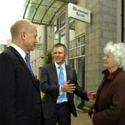 VOTE FOR US: William Hague and Gareth McKeever talk to Elsie Tyson, from Ambleside, in Kendal town centre