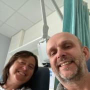 RECOVERING: Fiona and Mark Elliott in hospital following their operations.