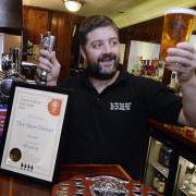 CELEBRATED: Phil Walker after winning the National Cider Pub of the Year in 2019