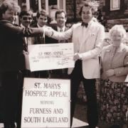 This undated photograph from our archives shows a cheque for Â£1,000 being handed over to St Mary's Hospice. From left: Dave Frith, Lord Cavendish, Joan Pollitt and Shirley Clarke