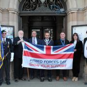 PAYING TRIBUTE: A flag was hoisted above Kendal Town Hall to mark the beginning of Armed Forces Week