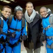 HIGH SPIRITS: Aston, Marvin, Jonathan and Ortise in their striking sky-dive suits