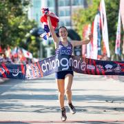 Ulverston Victoria High School student Jess Bailey has returned from Thailand as the new junior World Mountain Running champion