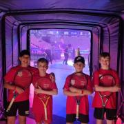 The boys in the arena before their warm-up competition