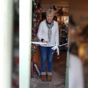 Eden Animal Rescue’s Kirkby Stephen Shop manager, Gill Jacobs opening the new shop at 43 Market Street