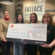 (left to right) Sally, Eliza, Amanda and Clare with the cheque.