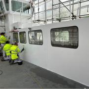 Windermere Ferry receiving a fresh coat of paint