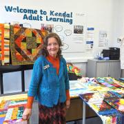 Susan Dixon transforms this Kendal Library room into a sea of colour during the first Saturday of each month