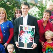 THANK YOU: Rory Stewart with staff and children at the Magic Garden Nursery