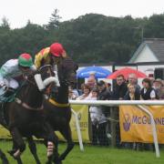 Pete, ridden by Lucy Alexander, just pips Jason Maguire aboard Red Kingdom to victory