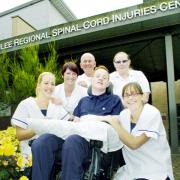 Will with staff at the Golden jubilee Regional Spinal Cord Unit in Middlesbrough