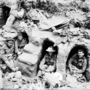 Members of the Kendal Pals in a captured German dugout
