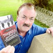 Author Gerry Lees at the Nether Kellet peace stone with his new book