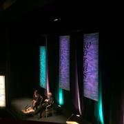 David Crystal on stage at Keswick with host Helen Hutchinson