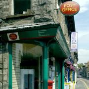 Longpool Post Office closes, stamps for sale at business on same street.