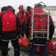 The casualty being stretchered off Pen-y-ghent