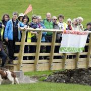The group of Quakers who are walking from Sedbergh to Barrow in Furness under the banner âWalking for Welfare for Allâ are pictured making their way past Grayrigg Foot...JON GRANGER...