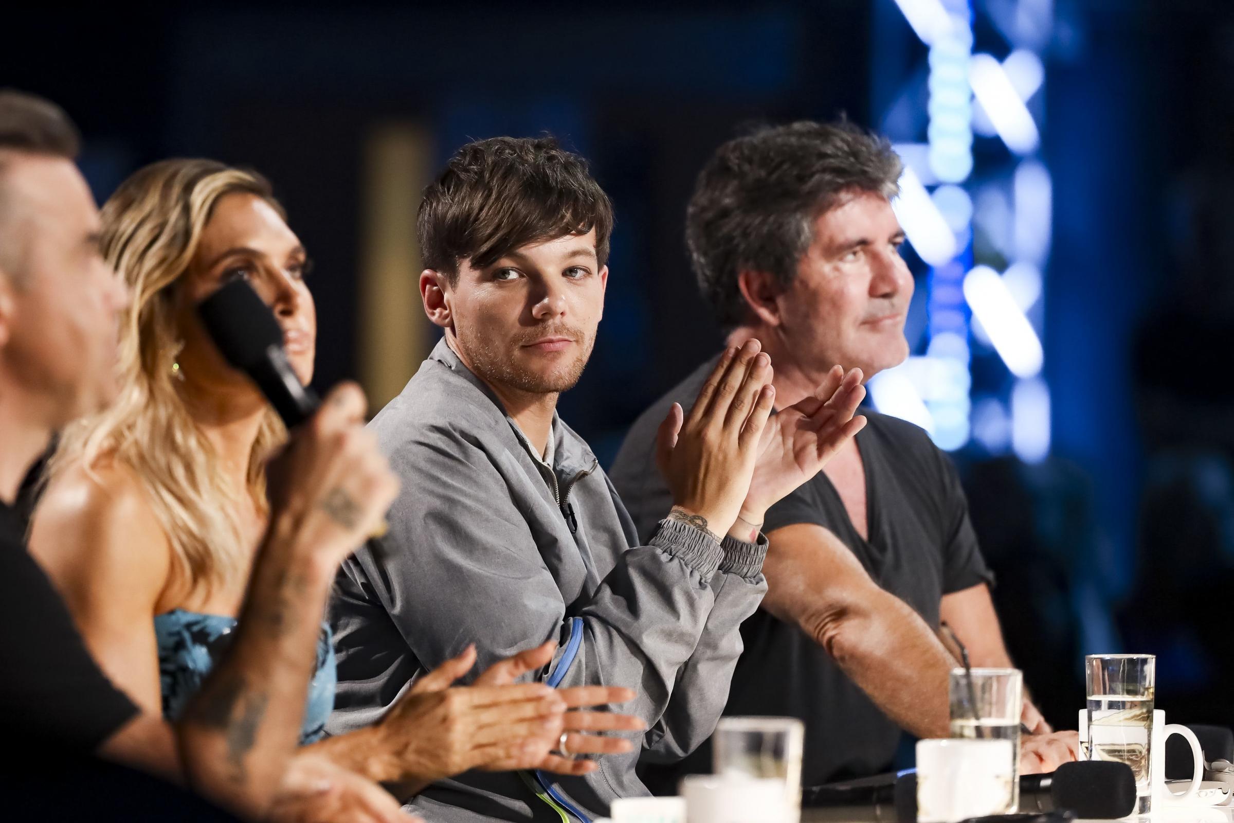 Last three X Factor contestants go head-to-head as series final begins